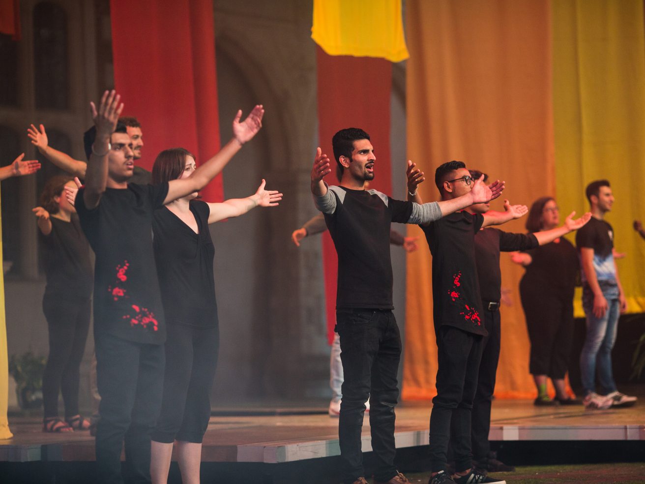 Refuge in Harmony participants singing together on the Opera Holland Park stage during their final performance.